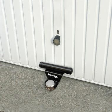 Master Lock MASTER LOCK Dispositivo antirrobo para puerta de g